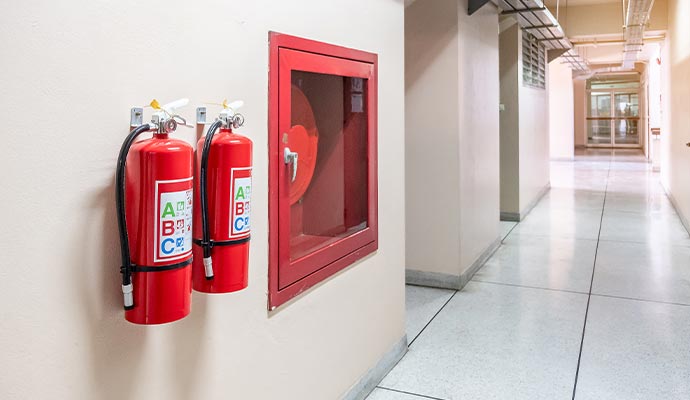 Fire extinguishers in hallway

            