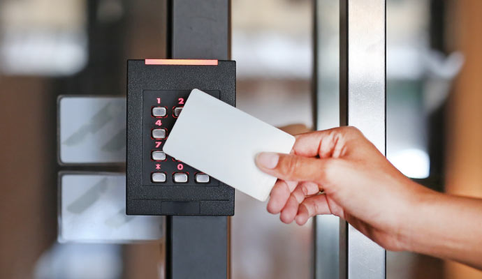 A person using key card reader