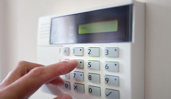 Home security system alarm keypad code entry.