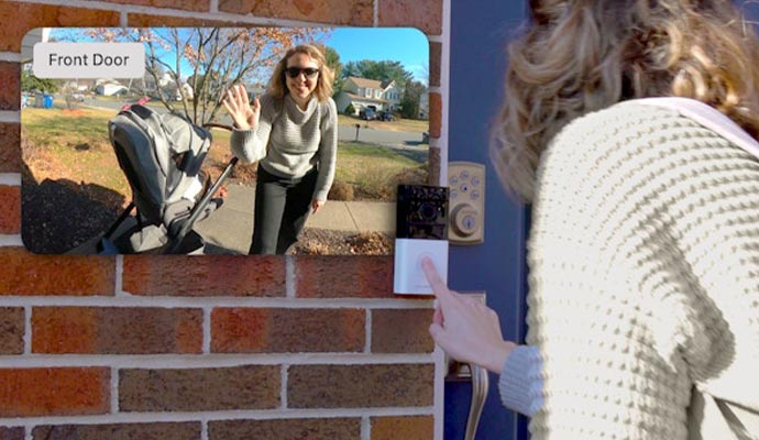 Person using  video doorbell camera